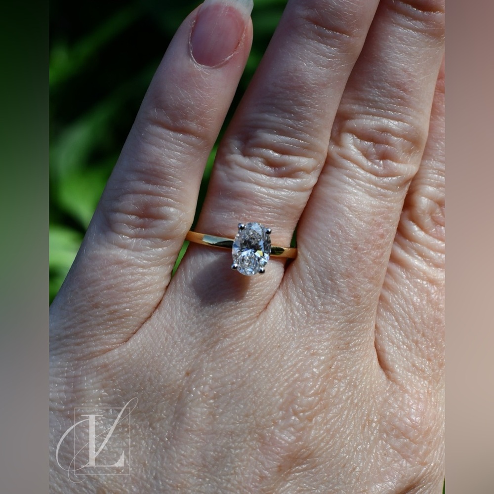 1.07 CT Lab-Grown Oval Solitaire in 14K Yellow Gold with White Gold Prong Tips